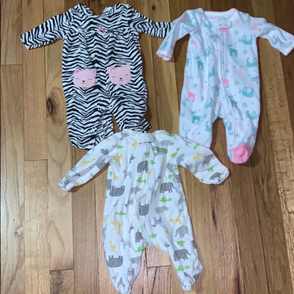 Baby pajamas x2 and a one piece outfit